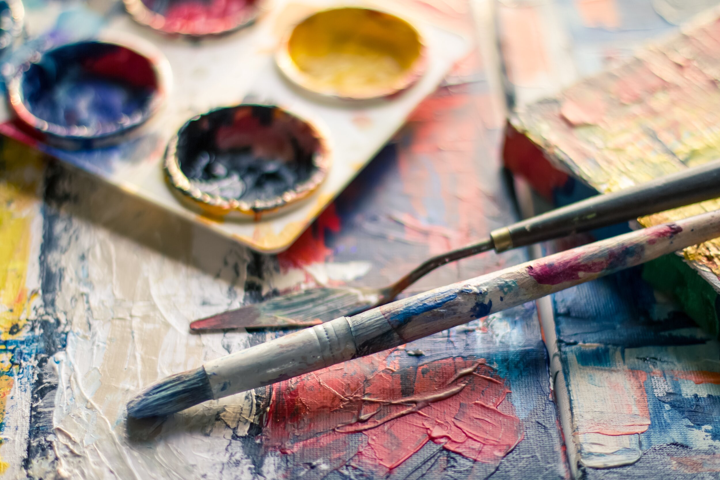 selective-focus-photography-of-paintbrush-near-paint-pallet-1047540.jpg